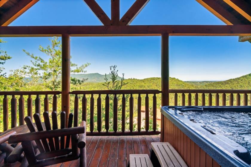 Smoky Mountain cabin with view of hot tub on a balcony